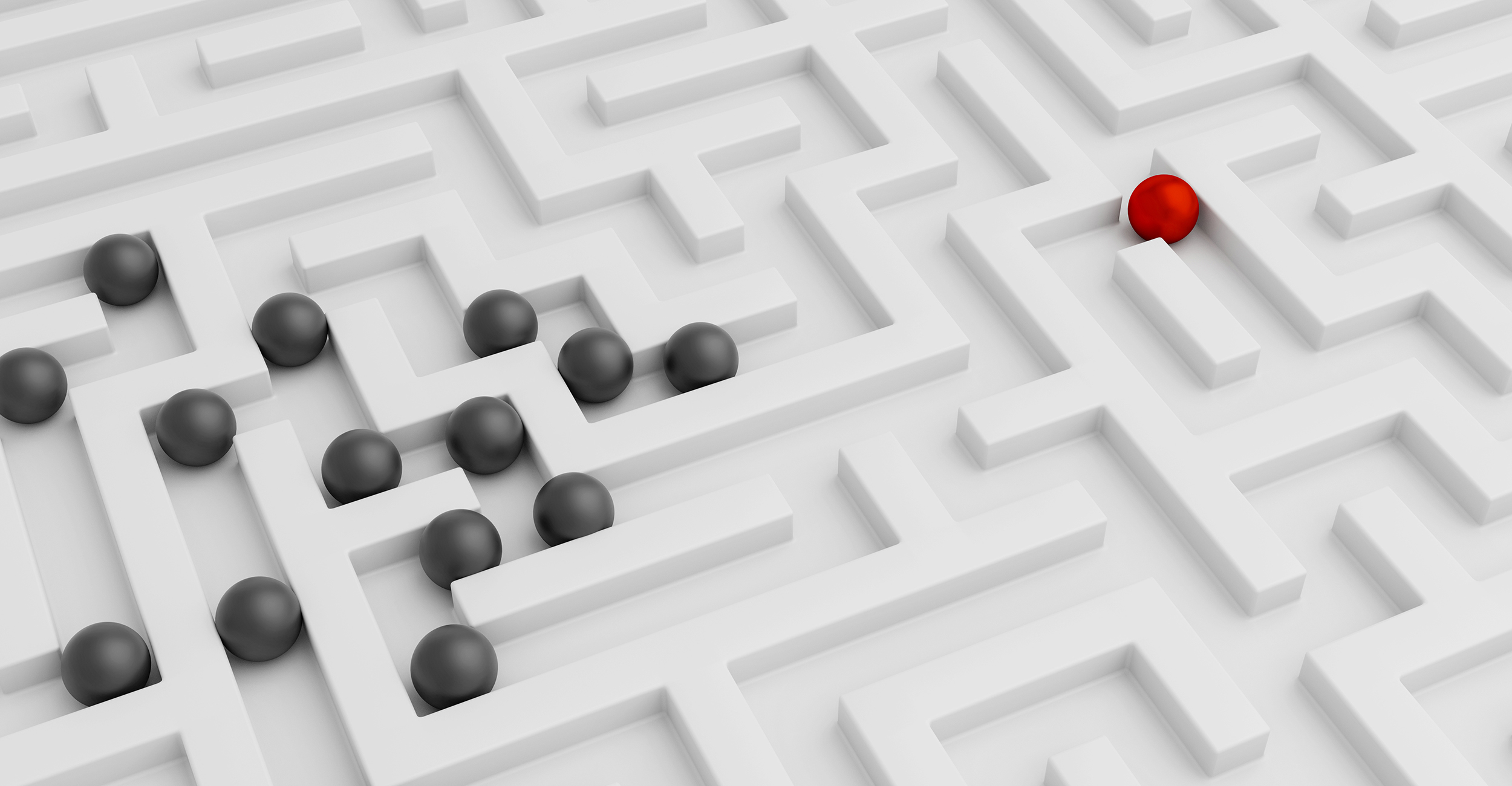 Boules rouges et noires dans un labyrinthe blanc